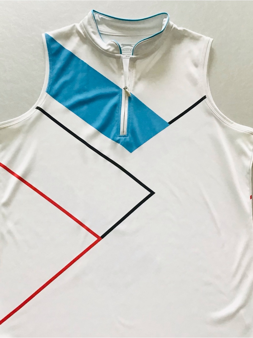 Slazenger White Sleeveless Golf Top with Blue, Black and Red Accents/M